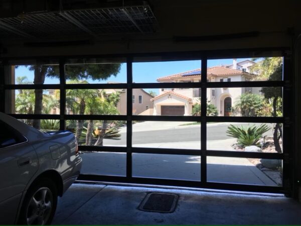 ultra modern black frameless glass garage doors w/ now technology