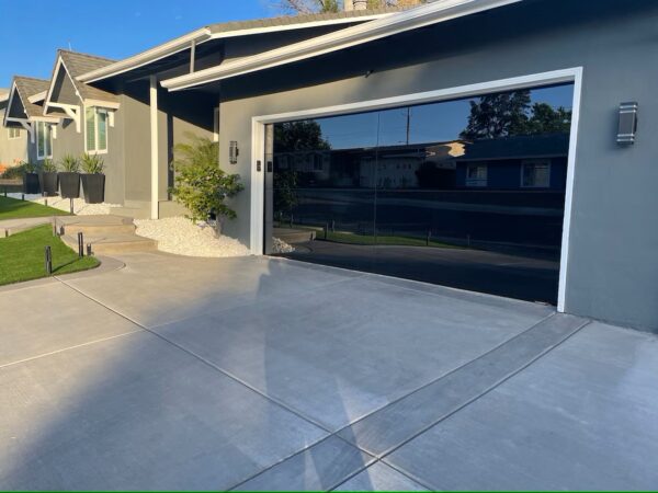 ultra modern black frameless glass garage doors w/ now technology