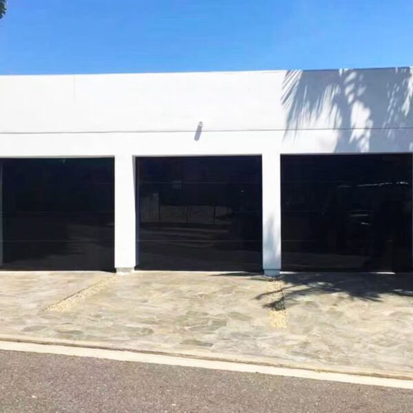 ultra modern black frameless glass garage doors w/ now technology